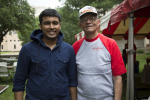 Irv Doty stands with PROMES scholarship student at the PROMES 40th Anniversary Reconnect and Mixer.