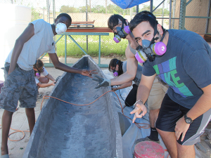 Ridwan working on concrete canoe