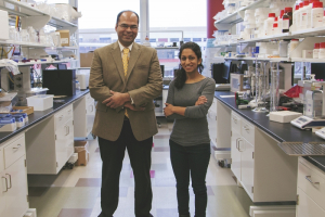 Birla (left) with Patel in his lab.