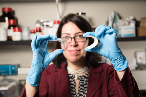 Powering the world: Haleh Ardebili, Bill D. Cook Assistant Professor in mechanical engineering, with her bendable battery roughly the size of a business card