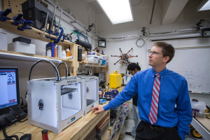 Always thinking, always inventing: Professor Aaron Becker in his lab