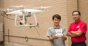 Gino Lim (right) and Seon Jin Kim with their airborne drone