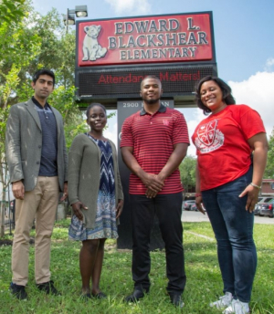 In Houston's Third Ward, the proud UH/iEducate crew are (l-r) Arun Gir, Bionka Edmundson, Jameel Jordan and Blackshear Principal Alicia Lewis