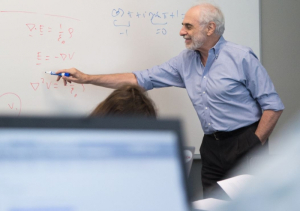 At the head of the class, Andrea Prosperetti challenges young students
