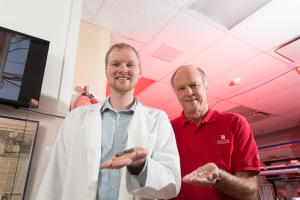 Ph.D. student Alex Smith (left) and mechanical engineering professor Ralph Metcalfe are collaborating with researchers at the Texas Heart Institute to radically improve blood-pumping devices for patients with heart failure