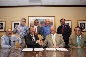 Celebrating a MoU between the University of Houston and the Indian Institute of Petroleum and Energy.
