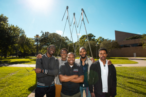 Professor Jerrod Henderson with some of his Cullen College students (L to R): Helder Mandingo, Tarami Readus, Peter Bristow and Kameron Bass.