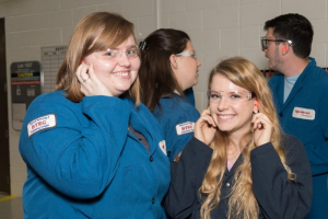 Workshop participants toured ExxonMobil labs to see best practices and safety standards in action.