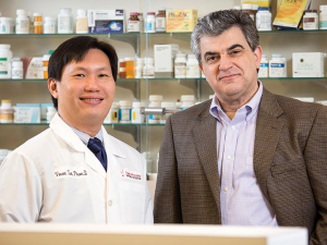 College of Pharmacy professor Vincent Tam, left, and Michael Nikolaou, professor of chemical and biomolecular engineering, are battling resistant bacteria, taking the guess work out of choosing the proper antibiotic combinations by building a device that will suggest combinations.