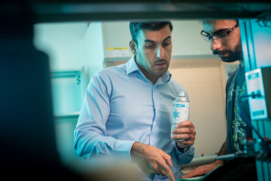 UH Cullen College of Engineering professor Hadi Ghasemi in the SurfEllent lab with a student researcher.