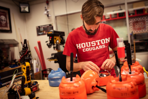 UH ECE student Jarrett Lonsford works on the electronics for a sensing drift node in Dr. Aaron Becker's lab on Thursday, Oct. 3, 2019.