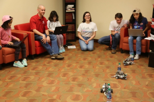 activities and workshops included an egg drop station, jewelry-making robot station, to name a few. 