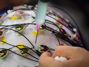 A brain-skull cap is a non-invasive way to collect data on brain activity.