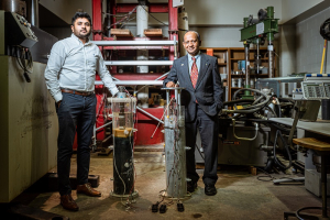 Professor Cumaraswamy Vipulanandan and his doctoral student Sai Anudeep Reddy Maddi in their UH Cullen College lab where they work on their smart cement and related research.