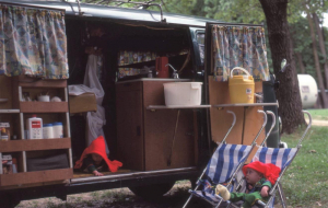 Aaron Becker shares his first experience with German engineering – exploring his family's VW camping van, while his twin brother watches, in 1983. [Photo credit: Aaron Becker.]