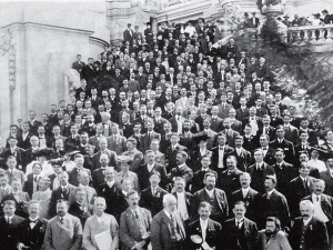 Power systems experts from around the world gathering in St. Louis in 1904 to discuss anything and everything electrical, including the operation of the then new networks of synchronous generators. 