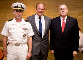 Lawrence Schulze, professor of industrial engineering, with Lt. Terry Turner, the Navy Recruiting District's Nuclear Programs Officer (right) and Dean Joseph Tedesco (center).