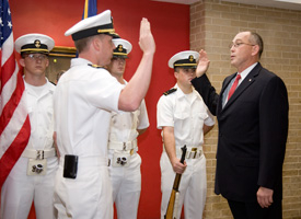 Lawrence Schulze, professor of industrial engineering, is commissed as the regional Naval Campus Liaison Officer.