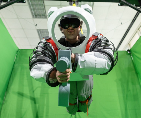 Paolo Mangili is suspended in mid-air as he goes through a zero gravity simulation.