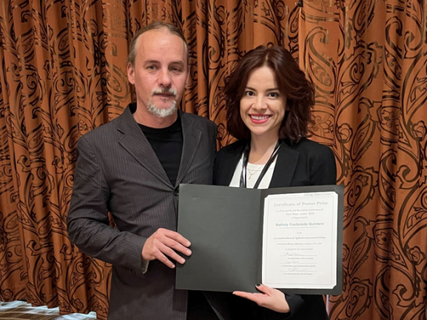 Doctoral candidate Nathaly Andrea Castaneda Quintero poses with Goran Majkic, research professor in the Mechanical Engineering Department, after winning the inaugural Poster Prize Competition at CCA 2023, the Coated Conductors for Applications International Workshop, held at UH in April. 