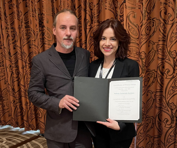 Doctoral candidate Nathaly Andrea Castaneda Quintero poses with Goran Majkic, research professor in the Mechanical Engineering Department, after winning the inaugural Poster Prize Competition at CCA 2023, the Coated Conductors for Applications International Workshop, held at UH in April. 