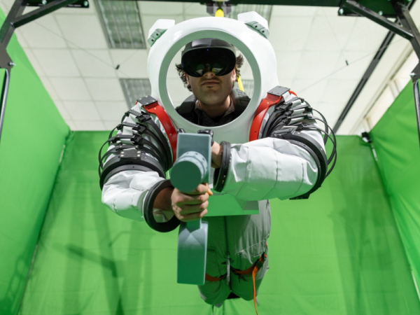Paolo Mangili is suspended in mid-air as he goes through a zero gravity simulation.