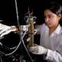 Environmental Engineering graduate student Archana Venkataramanan works with a electrocoagulation unit designed for drinking water purification research. Photo by Stephen Pinchback.
