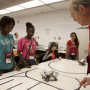 High School students who attended last year's G.R.A.D.E. Camp learned about robotics from ECE Professor John Glover.