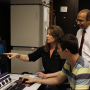 Dr. Badri Roysam and Dr. Leigh Leasure look over brain images with a graduate student researcher.