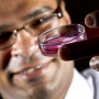 UH biomedical engineering Associate Professor Ravi Birla holds a patch of cardiac muscle grown in his lab.