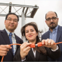 Powering up: Saeedeh Abbasi (center) works to restore power with the help Gino Lim and Masoud Barati