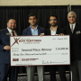 Hadi Ghasemi, Bill D. Cook Assistant Professor of mechanical engineering at the UH Cullen College of Engineering, accepts his 2019 Texas A&M New Ventures Competition (TNVC) winnings.