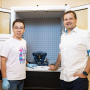 Graduate student Yuechuan (Alex) Xu, left, and Professor Peter Vekilov of the University of Houston with an atomic force microscope of the sort they used to capture the growth of amyloid beta fibrils implicated in Alzheimer’s disease.