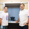 Graduate student Yuechuan (Alex) Xu, left, and Professor Peter Vekilov of the University of Houston with an atomic force microscope of the sort they used to capture the growth of amyloid beta fibrils implicated in Alzheimer’s disease.