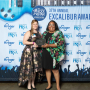 Inez Hutchinson [right], communications manager for the Communications Department of the Cullen College of Engineering, accepts one of the two gold Excalibur awards the department won from Felicia Perez, Houston chapter president of the Public Relations Society of America. 