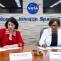 UH System Chancellor Renu Khator and JSC Director Vanessa Wyche sign an extension of a longtime partnership.