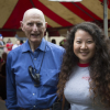 Ron Cambio stands with PROMES scholarship student at the PROMES 40th Anniversary Reconnect and Mixer.