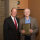 Joseph W. Tedesco, left, presents plaque to Engineering Rockwell lecturer Ronald Larson